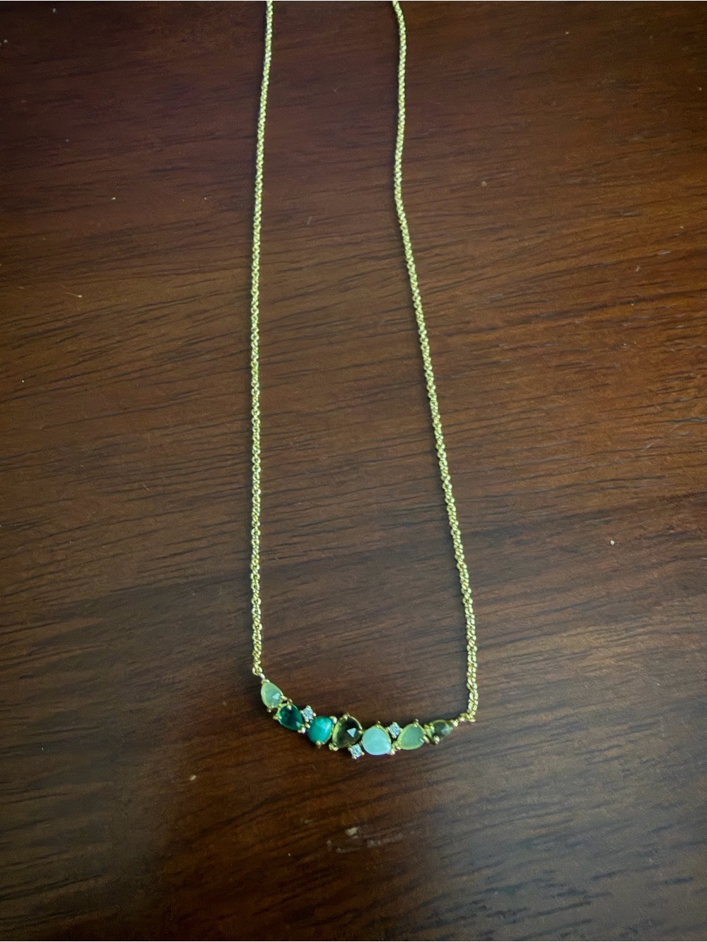 NEW ANTHROPOLOGIE Gold necklace with green and clear stones